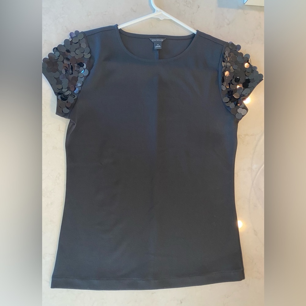 Ann Taylor black top with large sequin embellishments, size XS, new without tags